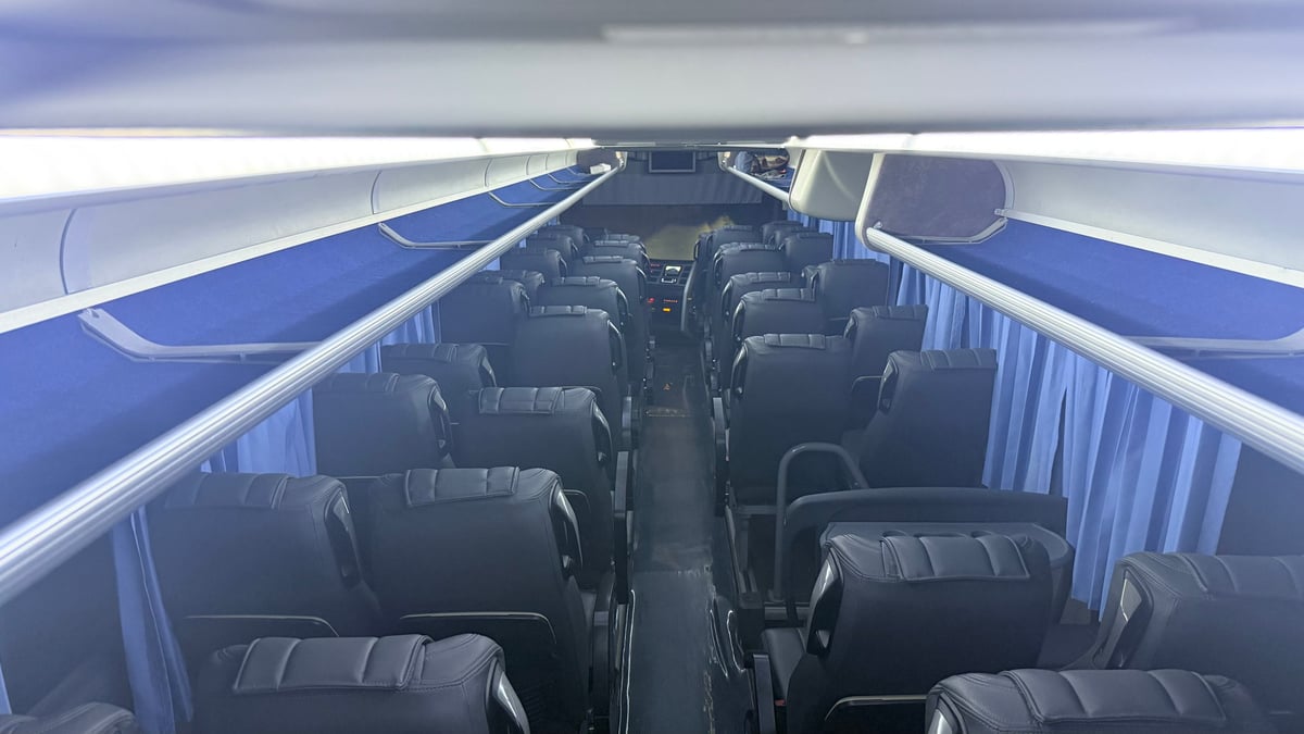 Luxury intercity coach interior with spacious aisles